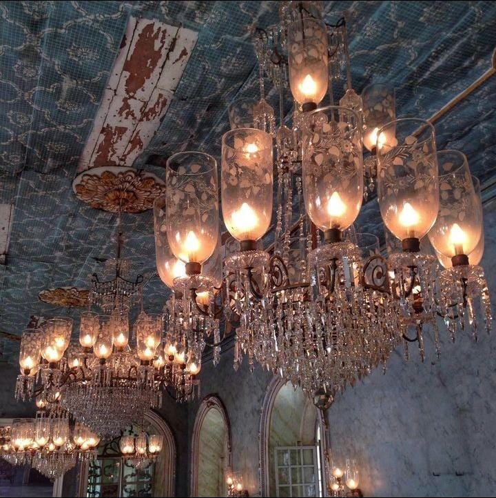 Stunning crystal chandelier illuminating the exquisite interior of Braganza House's ballroom.